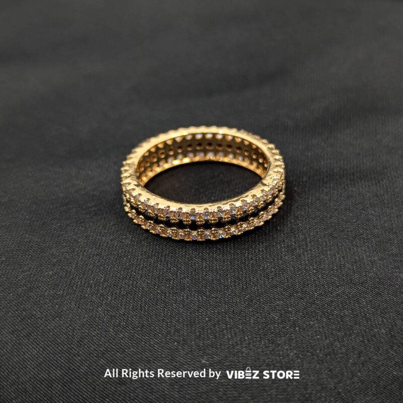 Gold-Tone Eternity Band with Dual Crystal Rows 1 Gold-tone eternity band with dual rows of sparkling crystals, perfect for elegant and timeless fashion, from Vibez Store.