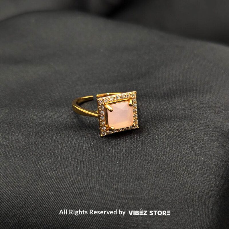 Elegant Square Gemstone Rings (Adjustable, Color Variations Available) 2 Gold-tone adjustable rings with square gemstones in rose pink, aqua blue, and sapphire variations, elegantly displayed by Vibez Store.