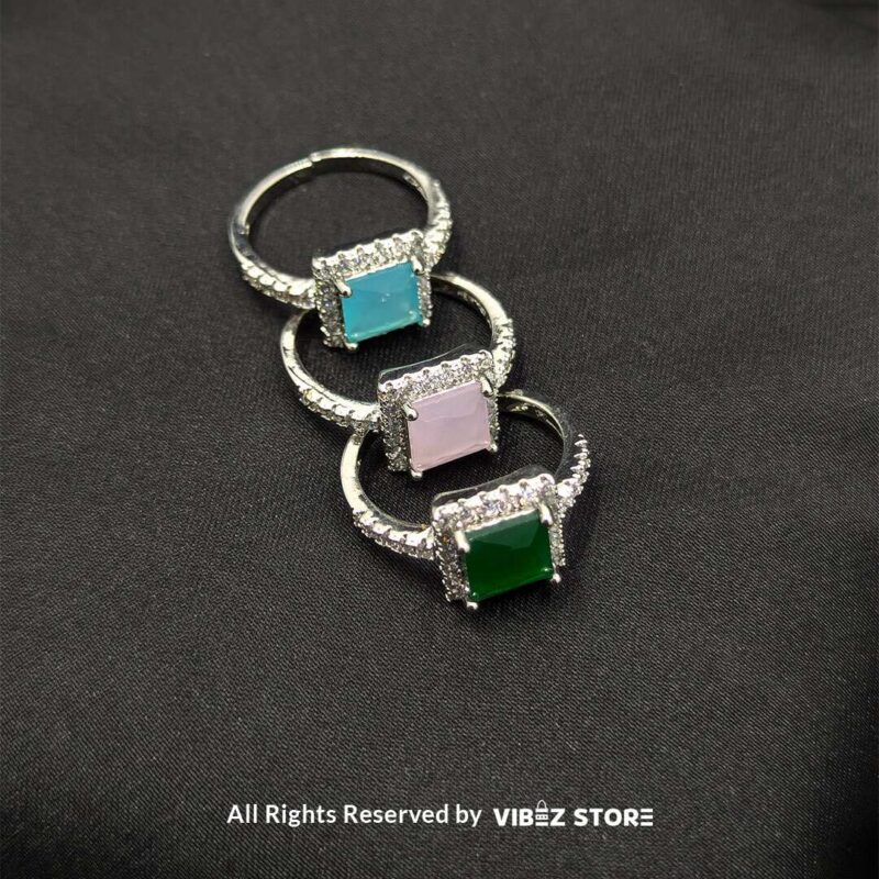 Sophisticated Square Gemstone Rings (Silver-Tone, Adjustable) 1 Silver-tone adjustable rings with square gemstones in aqua blue, rose pink, and emerald green, elegantly displayed by Vibez Store.