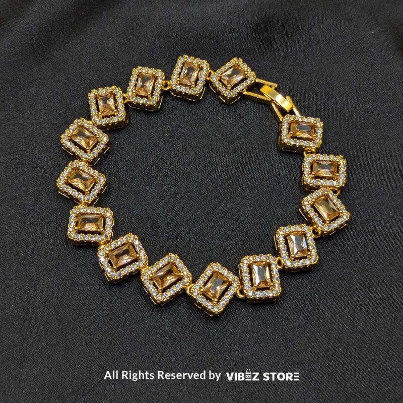 Golden Radiance Crystal Bracelet 4 Golden Radiance Crystal Bracelet featuring smoky quartz-style crystals with gold-tone frames and sparkling accents – Vibez Store.