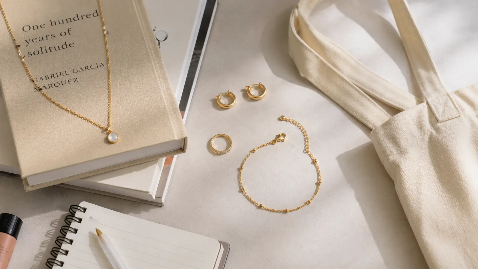 Best Jewellery Styles for University Girls in Pakistan: Simple Everyday Ideas 2 Essential everyday jewellery pieces for university girls arranged beside books and campus accessories