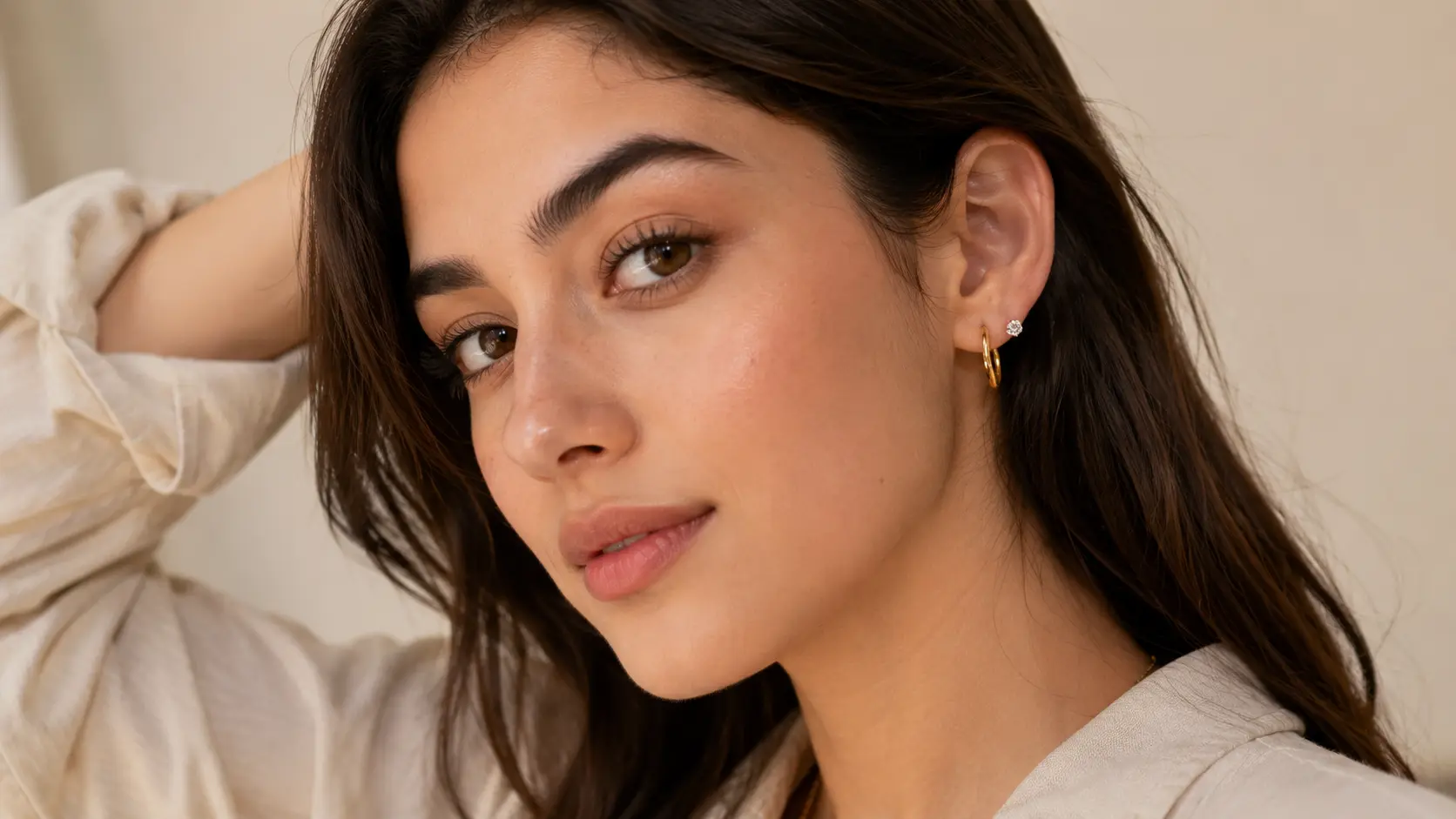 Best Artificial Jewellery for Daily Wear in Pakistan 3 Woman wearing lightweight stud earrings and small hoops for comfortable daily styling