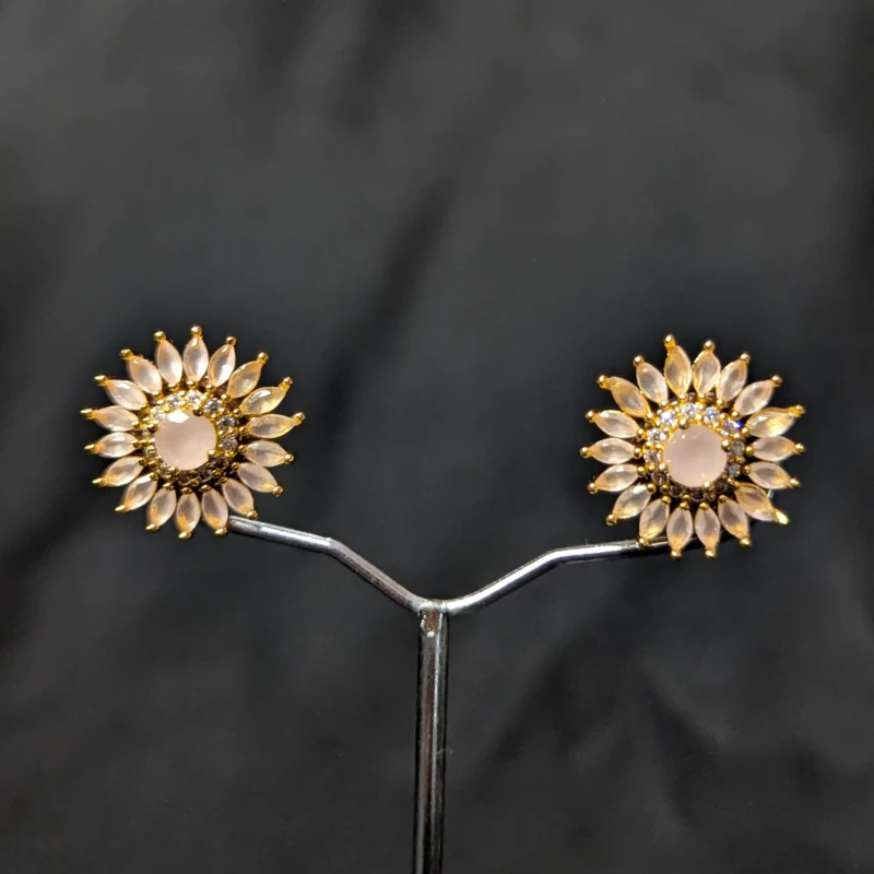 Blush Pink Gold Floral Stud Earrings for Women 2 Blush pink gold floral stud earrings with petal style stones and sparkling detail