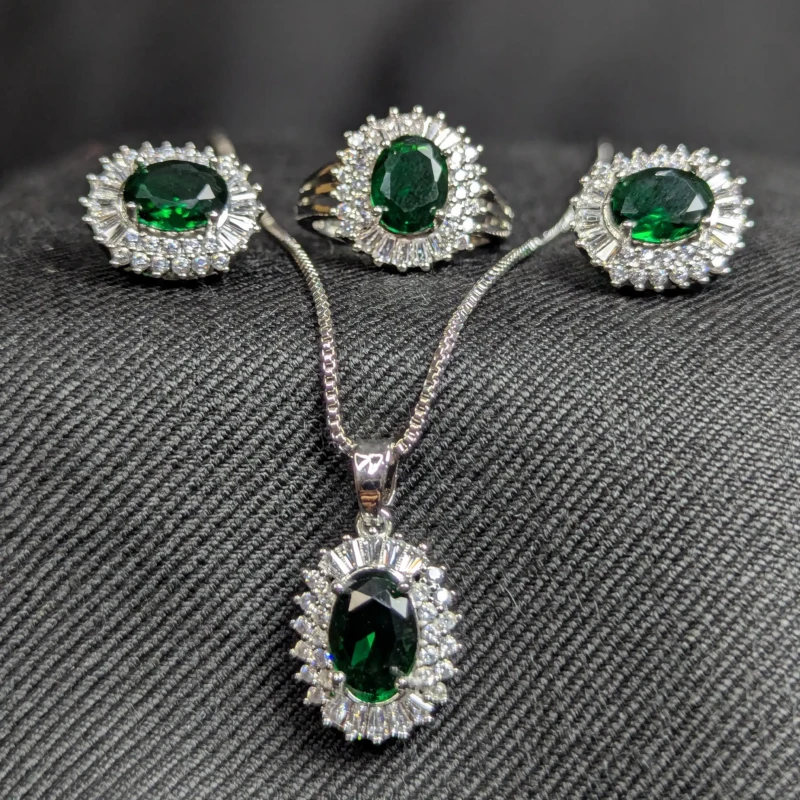 Emerald Green Silver Zircon Jewellery Set with Earrings, Pendant & Ring 2 Emerald green silver jewellery set with matching earrings pendant necklace and ring