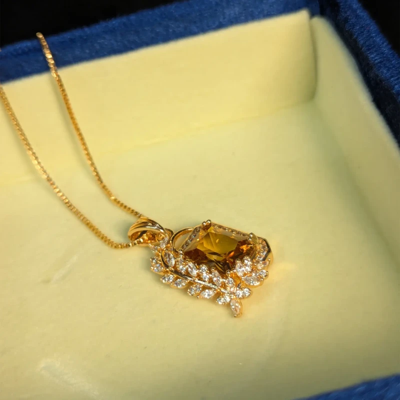Gold Amber Stone Pendant Necklace for Women 2 Gold amber stone pendant necklace with crystal style leaf detail