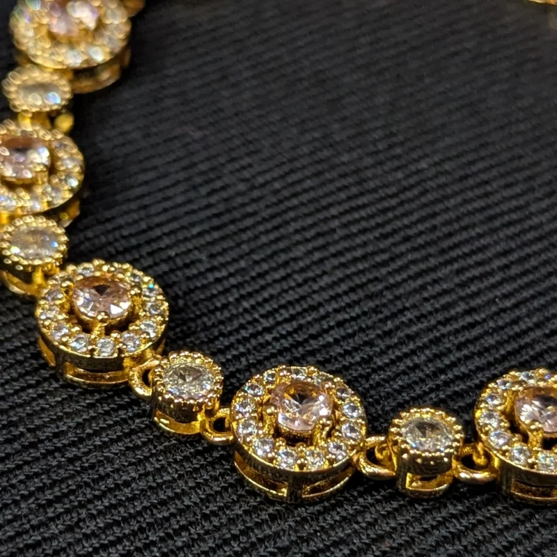 Gold Blush Pink Crystal Bracelet for Women 2 Close up of gold blush pink bracelet with round crystal halo links