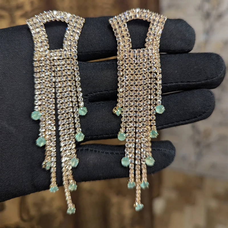 Gold Crystal Mint Green Tassel Earrings for Women 3 Gold crystal mint green tassel earrings with long fringe design and sparkling stones