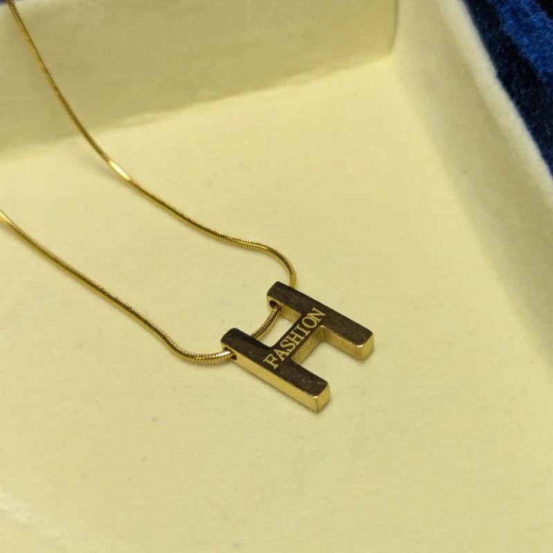 Gold H Fashion Pendant Necklace for Women 2 Gold H fashion pendant necklace with sleek chain