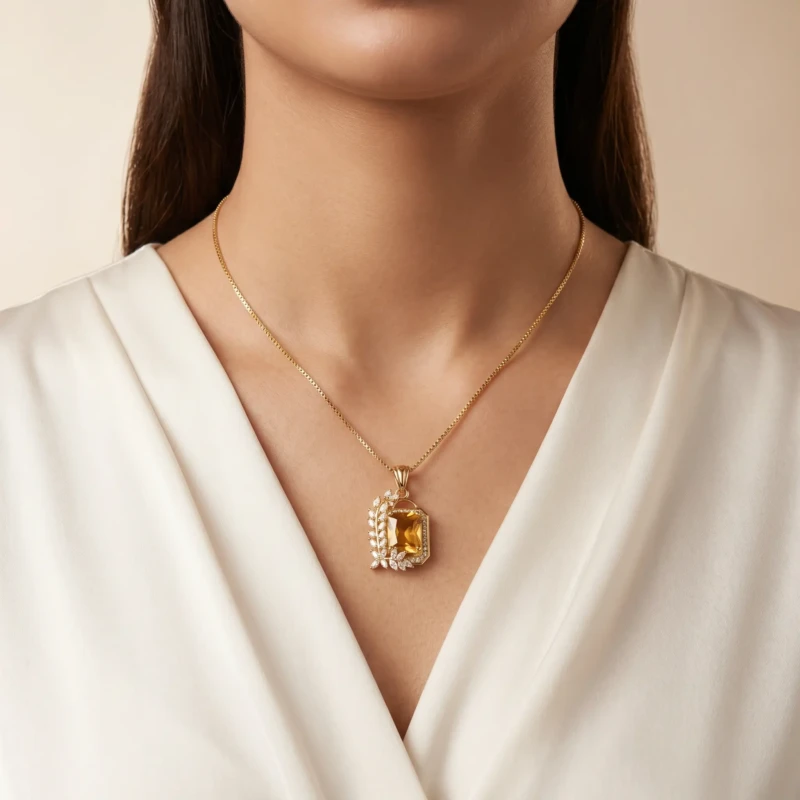 Gold Amber Stone Pendant Necklace for Women 1 Model wearing gold amber stone pendant necklace with white outfit