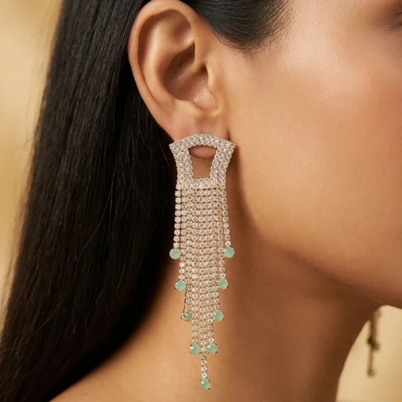 Gold Crystal Mint Green Tassel Earrings for Women 1 Model wearing gold crystal mint green tassel earrings for party and formal look