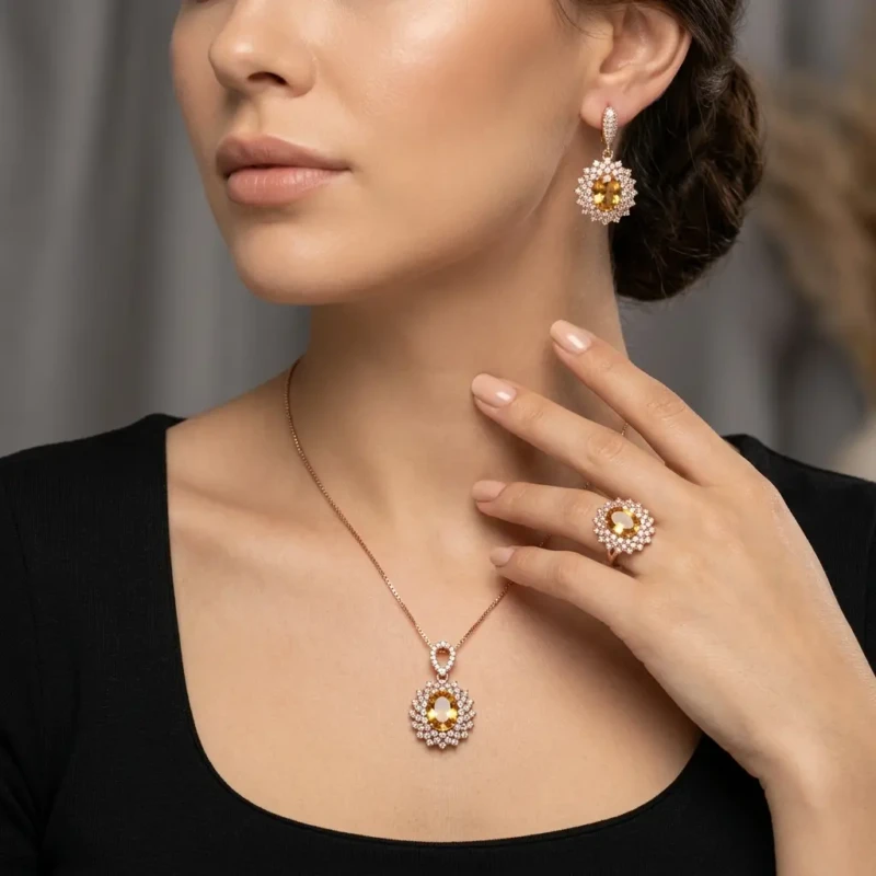 Champagne Yellow Zircon Jewellery Set with Earrings, Pendant & Ring 1 Model wearing golden yellow jewellery set with earrings necklace and ring