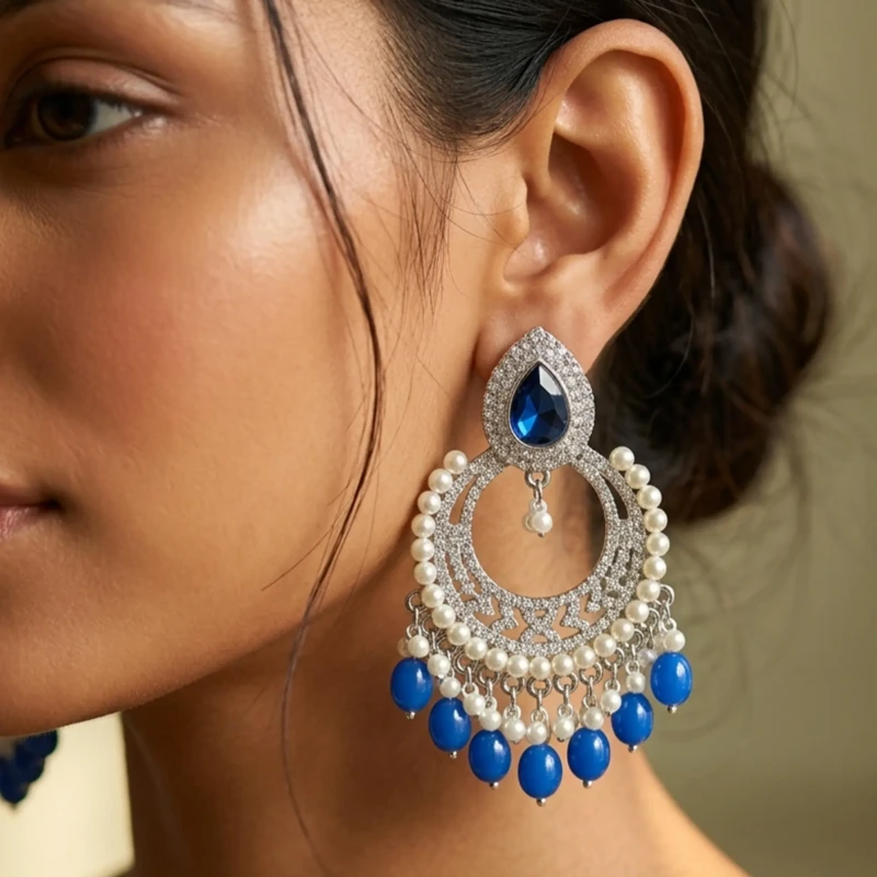 Royal Blue Silver Chandbali Earrings for Women 1 Model wearing royal blue silver chandbali earrings with traditional festive look