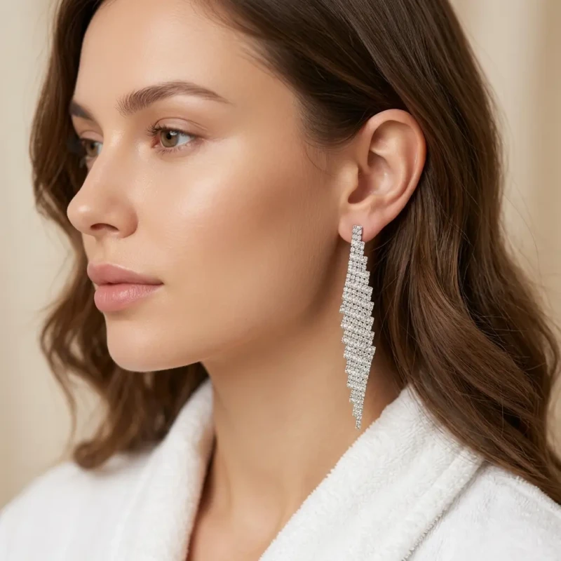 Silver Crystal Long Dangling Earrings for Women 1 Model wearing silver crystal long dangling earrings for formal party look