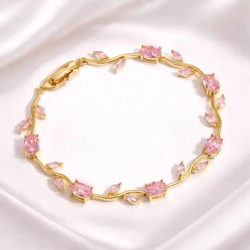 Pink Stone Gold Vine Bracelet for Women 2 Pink stone gold vine bracelet with leaf design and clasp closure