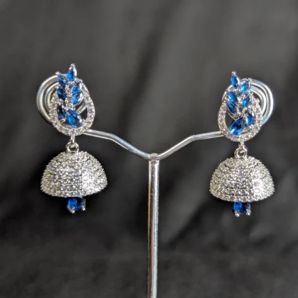 Pair of royal blue silver dome jhumka earrings with crystal style stones