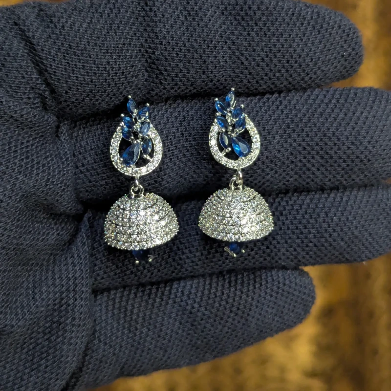 Royal Blue Silver Jhumka Earrings for Women 4 Royal blue silver jhumka earrings with leaf style stones and sparkling dome design