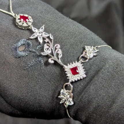 Ruby red silver hathphool hand bracelet with floral design and zircon style stones