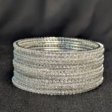 Stacked silver crystal bangles set with full rhinestone style sparkle