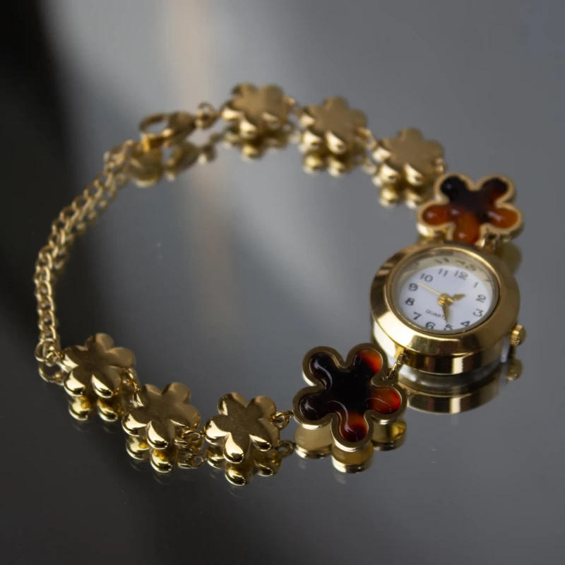 Gold-Tone Brown Floral Bracelet Watch for Women 2 Full view of gold-tone women’s watch with brown flower bracelet links