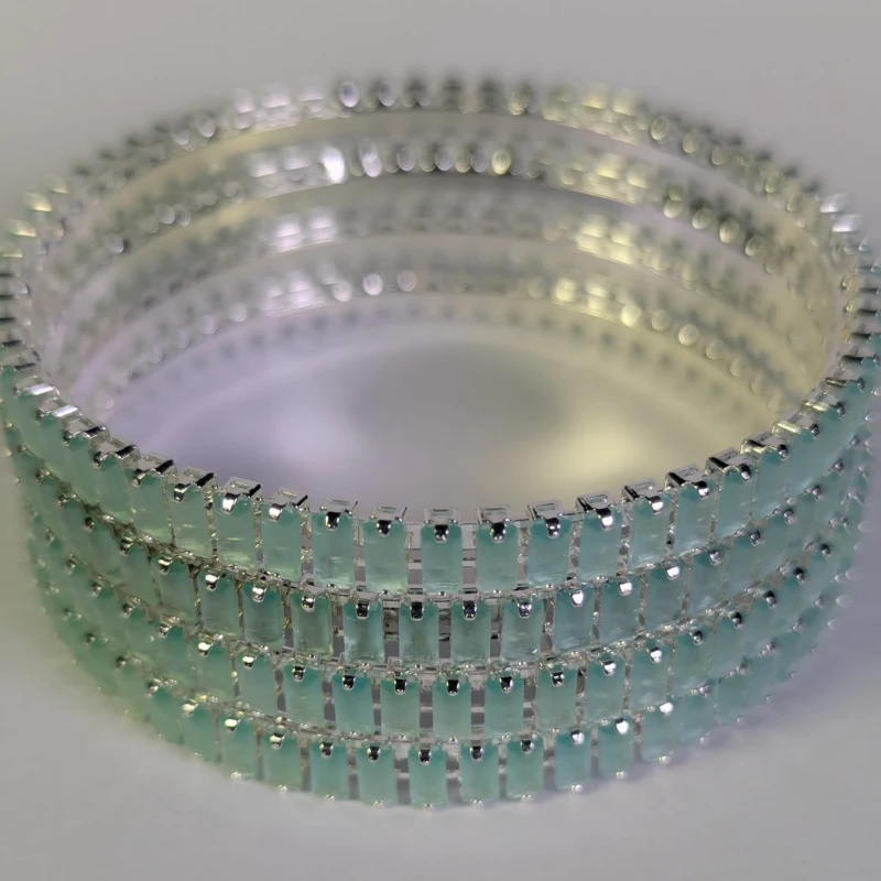 Silver-Tone Mint Green Crystal Bangle Set for Women 3 Close-up of silver-tone bangle set with mint green rectangular stones