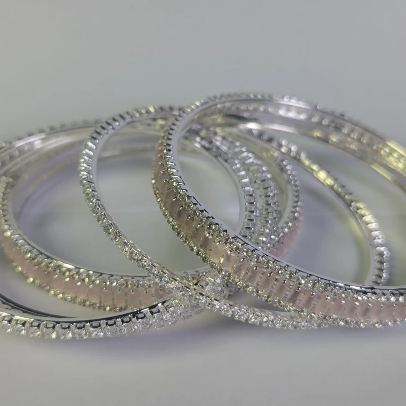 Silver-Tone Pink Crystal Bridal Bangle Set for Women 4 Close-up of silver-tone bangles with pink rectangular and clear crystals