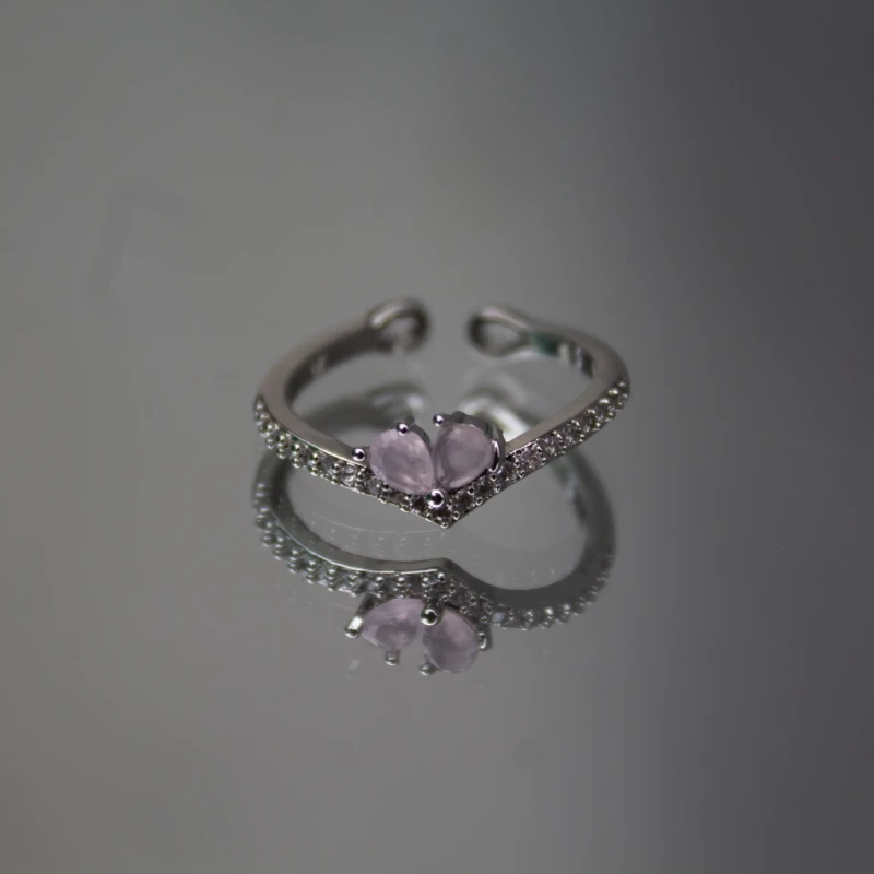 Silver-Tone Pink Crystal Butterfly Ring for Women 2 Front view of silver-tone pink butterfly ring with V-shaped crystal band