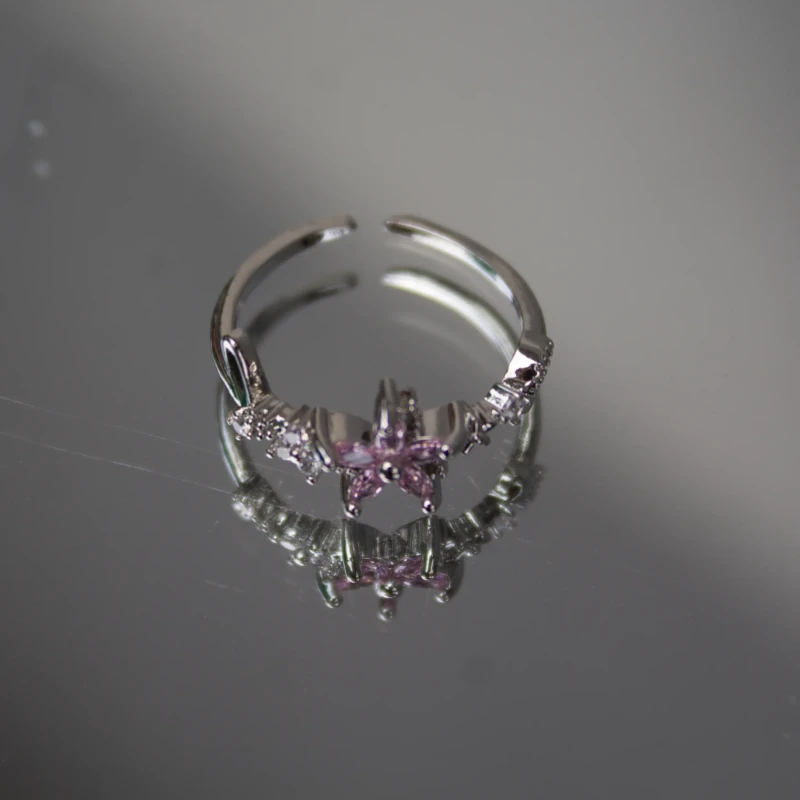 Silver-Tone Pink Crystal Flower Ring for Women 2 Angled view of silver-tone flower ring with pink and clear crystals