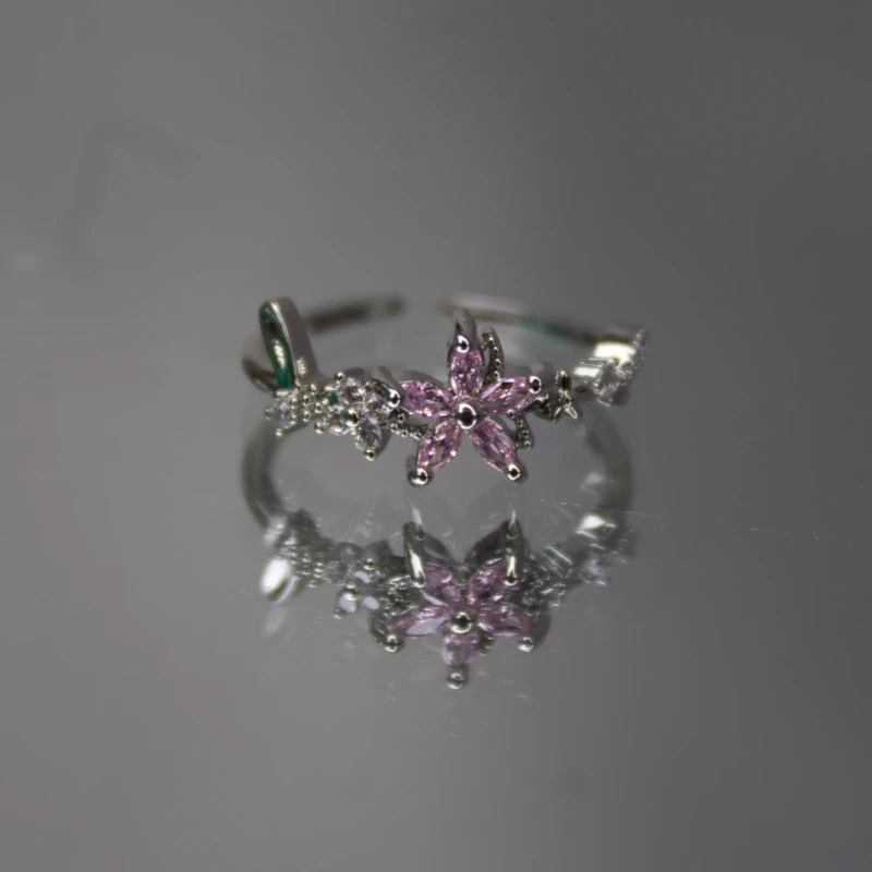 Silver-Tone Pink Crystal Flower Ring for Women 3 Front view of women’s silver-tone ring with pink crystal flower